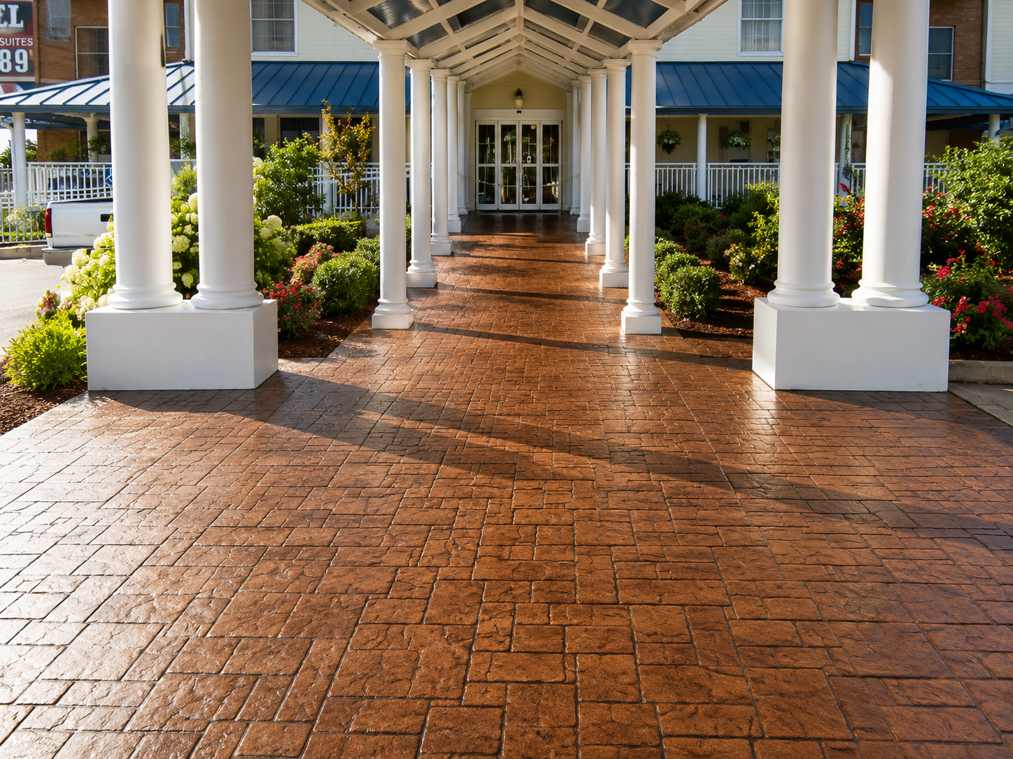 Decorative stamped concrete overlay walkway leading to a Walnut Creek front entry
