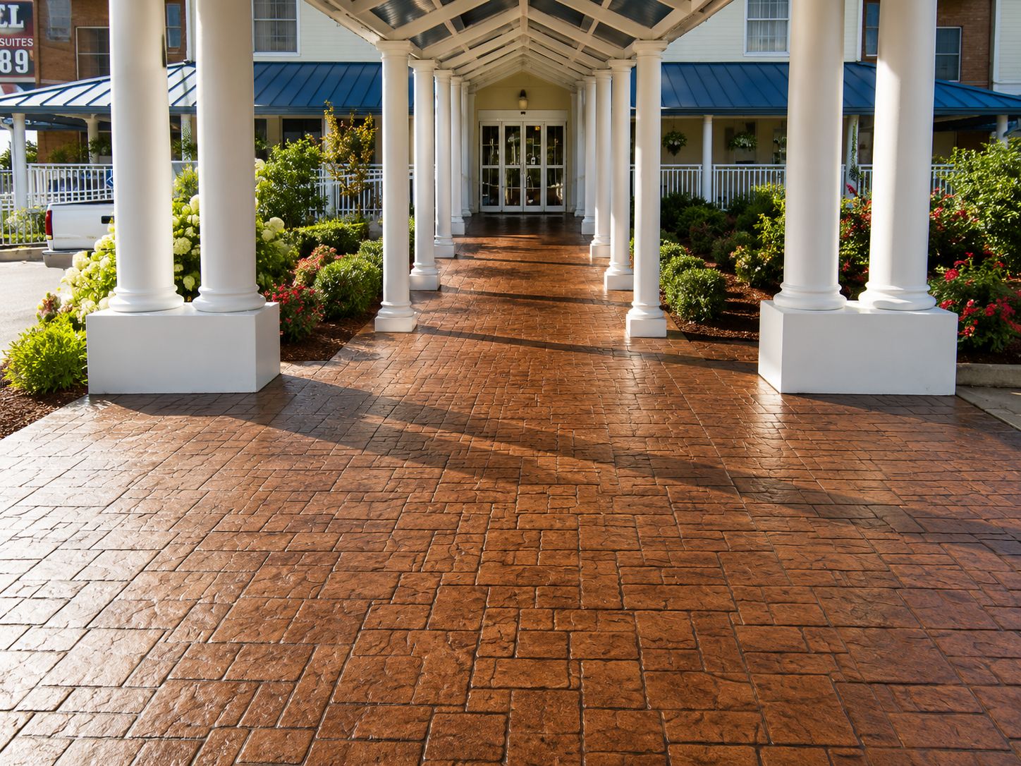 Decorative stamped concrete overlay walkway leading to a Walnut Creek front entry